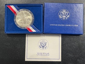 lot 9 image: 1986-P Statue of Liberty Silver Dollar Uncirculated Only 723,635 Minted