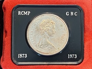 lot 59 image: 1973 RCMP Canada Dollar