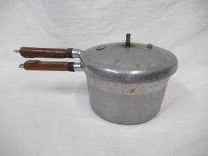 lot 10 image: Presto 4 Quart Pressure Cooker with Wood Handles