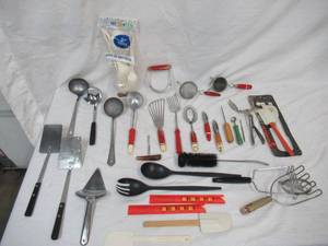 lot 24 image: Lot of Vintage Utensils. Some with wood handles.