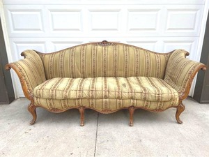 lot 35 image: Vintage Sofa with wood trim. 89 long.