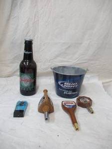 lot 58 image: Vintage Beer Paraphernalia. Budweiser Bottle Bud Lite bucket and Beer Tabs
