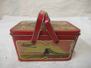 lot 64 image: Vintage Metal Lunch Box with 3 noise maker toys