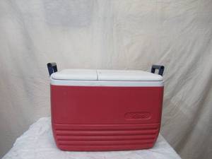 lot 109 image: Igloo Cooler. 56 Quart with drain. Red and white.