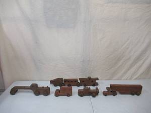 lot 111 image: Lot of Vintage Handmade Wood Childrens Toy Vehicles.
