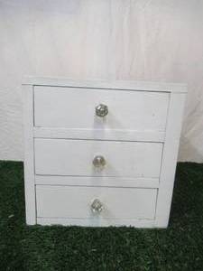 lot 143 image: Vintage painted wood set of table top dovetailed drawers with glass knobs.