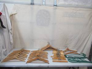 lot 178 image: Lot of Vintage Wood Hangers20 wood Coat Hangers,17 wood Pant Hangers and 2 sets of Clothes Stretchers