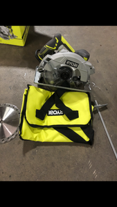 RYOBI 15 Amp Corded 7-14 in. Circular Saw with EXACTLINE Laser Alignment System, 24T Carbide Tipped Blade, Edge Guide and Bag