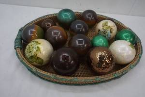 lot 51 image: Centerpiece Wicker Basket with a Variety of Decorative Balls