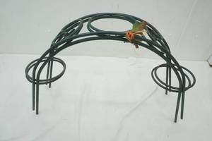 lot 69 image: 2 Flower Pot Holders (half Circles)