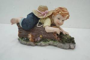 lot 71 image: Statue of a Child & Turtle