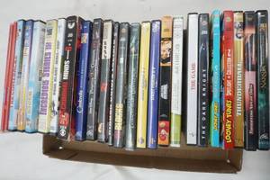 lot 107 image: Variety of DVDs, 16 Blocks, Family Guy, Justice League, Looney Toons and more