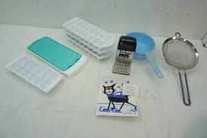 lot 176 image: Strainer, Iced Cube trays, cheese grater, swedish washcloth