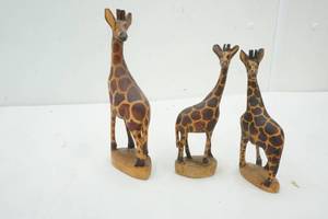 lot 212 image: 3 Small Hand carved wood Giraffes