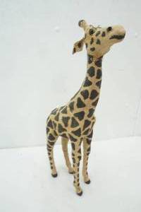 lot 213 image: Giraffe covered in Burlap 19 tall