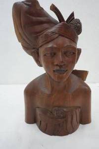 lot 215 image: Hand Carved wood Bauli Figure