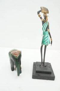 lot 221 image: African Wood Hand Carved Elephant & Lady Statue made Metal
