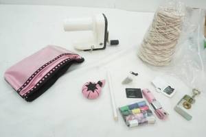lot 248 image: Loop Thread Machine, Thread, small pink bag sewing kit