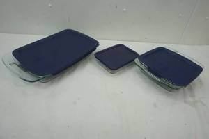 lot 264 image: 3 Pyrex baking dishes with Blue Covers