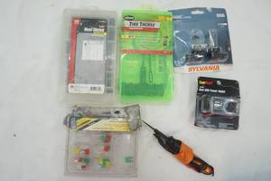 lot 479 image: Automotive Supplies, Tire Tackle Kit, Sylvania Basic light bulbs, tester, Heat Shrink Tubing Kit