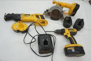 lot 504 image: DeWalt Drill, Sawall, circular saw with 5 batteries and a Charger