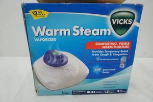 lot 548 image: New Vicks Warm Steam Vaporizer