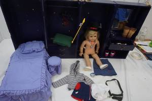 lot 550 image: American Doll with Blue Wooden Trunk and accessories