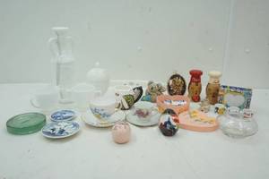 lot 574 image: Milk Glass creamer,Sugar, Salt & Pepper Shakers, Tea Cups with Saucers, Fish Paper weight and more