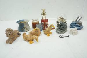 lot 577 image: Home Decor, Lion, Bear Brown Ducks and more