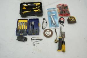 lot 610 image: Variety of Tools, Sonic Scrubber Detail Pro Kit, Tape Measure, 14 Piece Drill Bits and more
