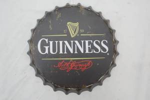 lot 665 image: Guinness Bottle Top Hanging Tin 14