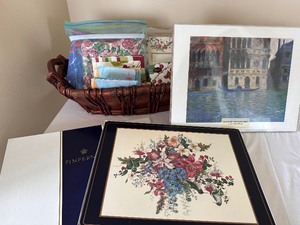 lot 171 image: Two Sets of Placemats and a Basket of Cocktail Napkins