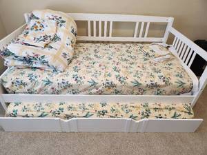 lot 129 image: White Wood Daybed with Trundle and Bedding Included