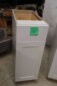 lot 215 image: Hampton Bay Cabinet 1-door1-drawer 12x24-12x34-12 (New)