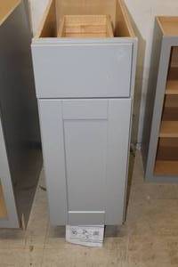lot 218 image: Hampton Bay Cabinet 1-door1-drawer 12x25x34-12 (New)