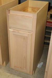 lot 229 image: Hampton Bay Cabinet Unfinished 1-door1-drawer 24x24x34-12 (New)