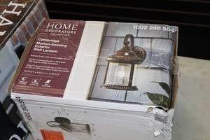 lot 273 image: Home Decorators Collection Cambridge Motion-Sensing Exterior Wall Lantern Bronze Finish with Seeded Glass Shade