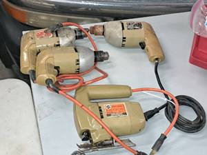 lot 560 image: Lot of (4) Black & Decker Power Tools - (3) Drills and (1) Jig Saw