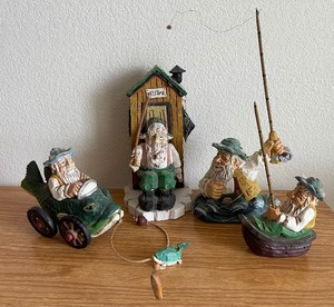 Four David Frykman The Fisherman figurines with boxes