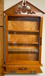 Large hanging wood curio cabinet with glass door