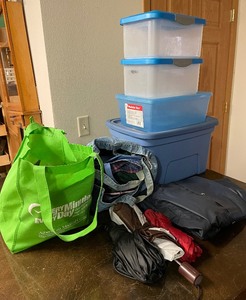 Four Rubbermaid Totes, Umbrellas and Bags Lot