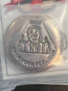 lot 04 image: 2.2 TROY OZ .999 FINE SILVER DONALD TRUMP F YOUR FEELINGS ROUND SEALED