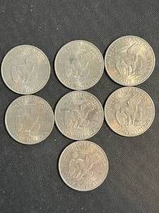 lot 13 image: 7 US EISENHOWER DOLLARS