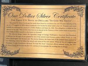 lot 97 image: 3 US BLUE SEAL $1 SILVER CERTIFICATES IN INFO. BOOK