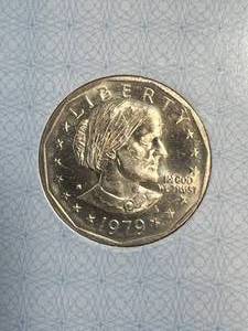 lot 104 image: 1979-S US SUSAN B ANTHONY DOLLAR AACGS MS63