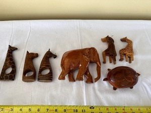 lot 72 image: Three Hand Carved Wooden Napkin Rings, Two Hand Carved Folk Art Animals Sitting on Stools, Once Hand Carved Elephant and a Hand Carved Wooden Turtle Jewelry Box