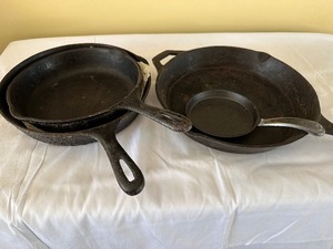 lot 79 image: Set of Three Vintage Cast Iron Pans