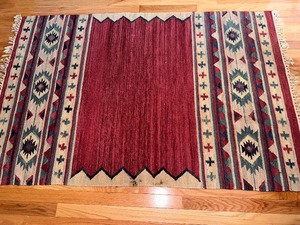 lot 24 image: Throw Rug Measuring 64 by 41