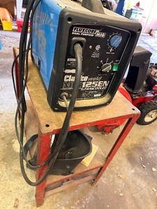 lot 169 image: Clarke 125 Fluxcore Dual Purpose MIG Welder on Cart and Masks