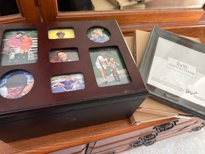 lot 132 image: Two New Frames and Photo Box